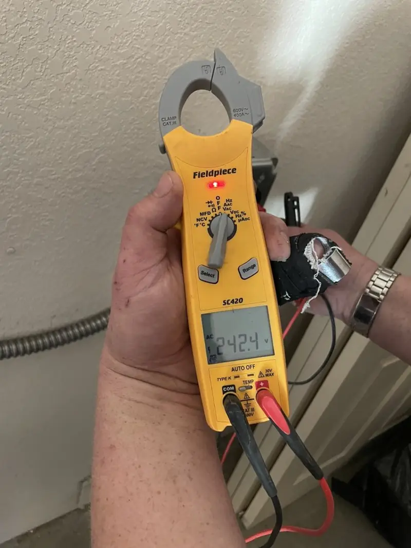 Voltage testing with clamp meter during Generator Installation in Camp Pendleton South
